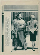 Princess diana of wales dwarfed by suno wrestler. - Vintage Photograph