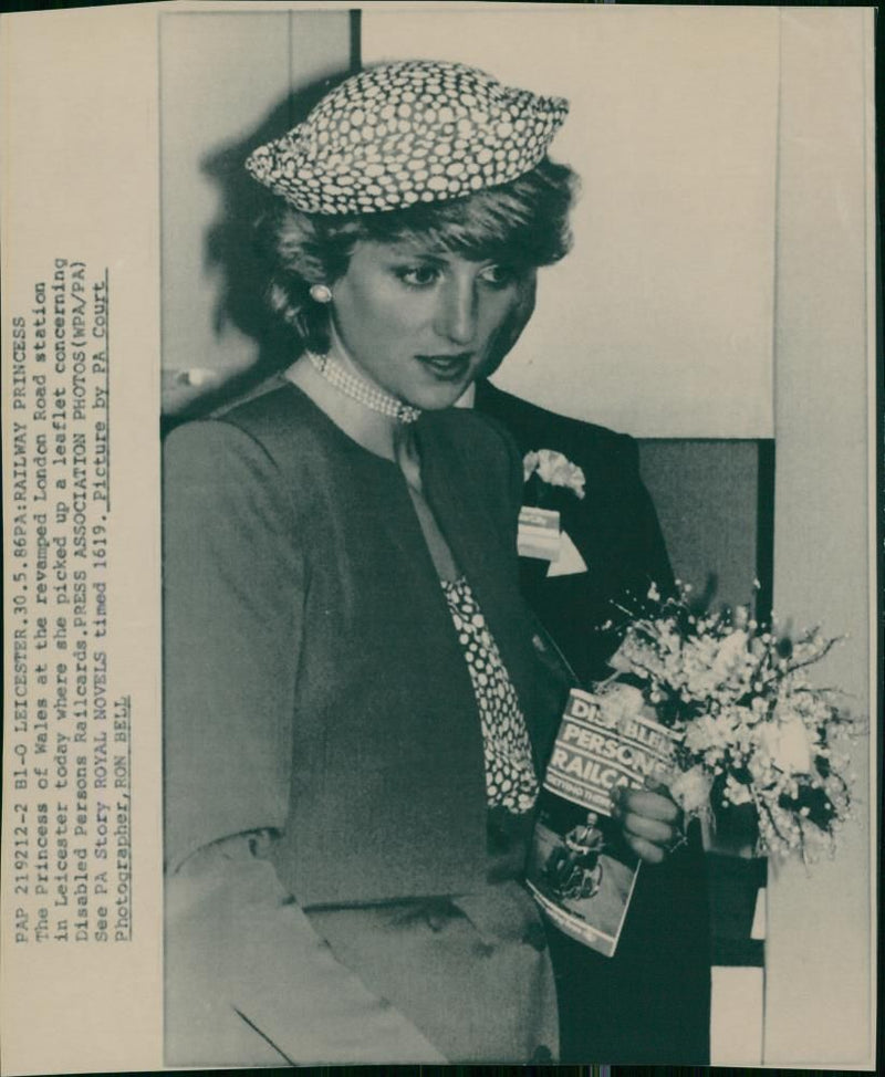 Princess diana of wales holding a flowers. - Vintage Photograph