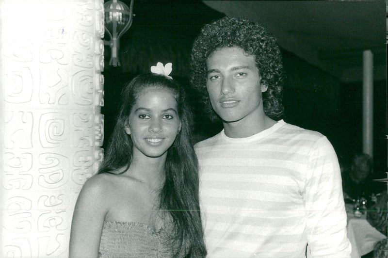 Simon Teihotu Brando's son Tehotu together with the Vaitiare Hirshon model - Vintage Photograph