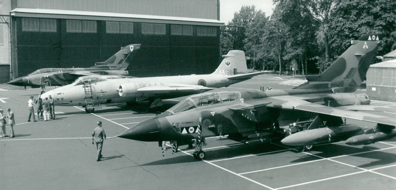 Jets parked with some group of people. - Vintage Photograph