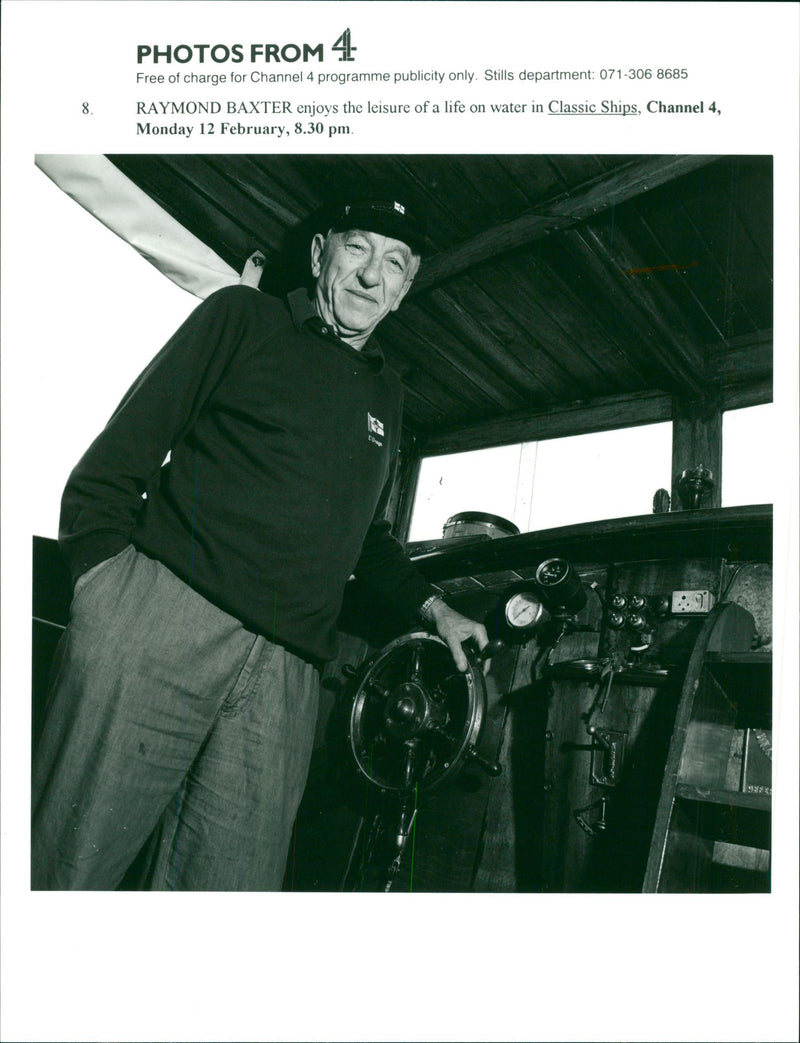 Raymond Baxter enjoys the leisure of a life water in Classic Ships. - Vintage Photograph