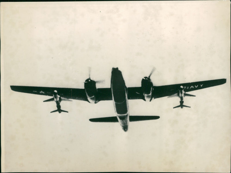 The Petrel and P-2V Neptune aircraft. - Vintage Photograph