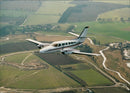 The Cessna in flight. - Vintage Photograph