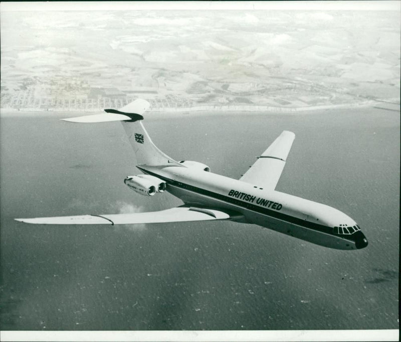British United first VC-10 in flight and wearing the company livery. - Vintage Photograph