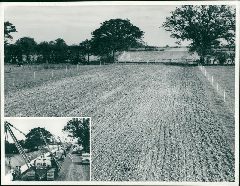 The inset photograph shows pipe lowering operations, the largest photograph taken at the identical location shows the reinstated working width. - Vintage Photograph