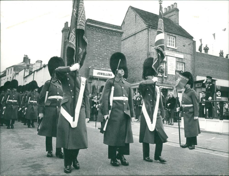 He takes the salute at the march-past in the market place. - Vintage Photograph
