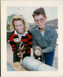 Ferret owners - Vintage Photograph