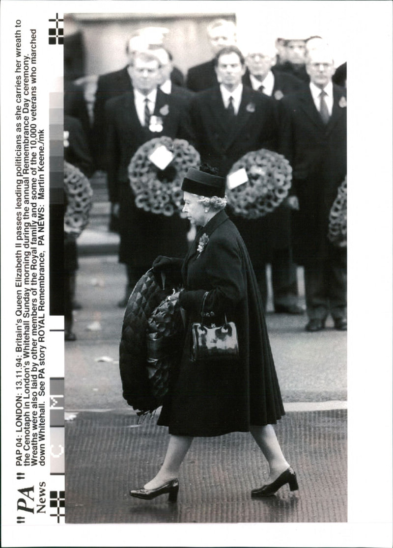 Britain Queen Elizabeth II passes leading politician. - Vintage Photograph