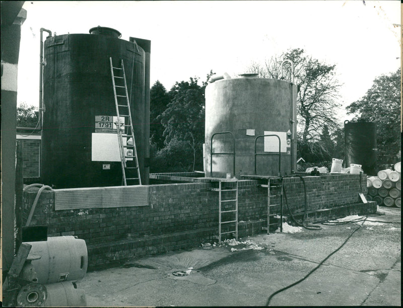 The tank in Bryer chemicals yard. - Vintage Photograph