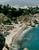 Dramatic landscapes and sandy coves. - Vintage Photograph