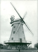 This old post mill at Friston, in Suffolk, still dominates the landscape. - Vintage Photograph