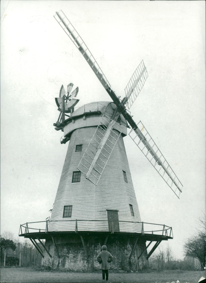 This old post mill at Friston, in Suffolk, still dominates the landscape. - Vintage Photograph