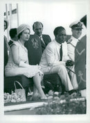 Queen Elizabeth and Prince Philip are watching parade in Ghana together with President Nkrumah - Vintage Photograph