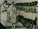 Queen Elizabeth inspects a Nigerian parade event - Vintage Photograph
