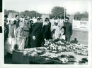 Indira Gandhi watches when Queen Elizabeth and Prince Philip lay a wreath on Mahatma Gandhi's grave - Vintage Photograph