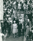 Princess Alexandra's wedding. Queen Elizabeth and Prince Philip and others heading out of the church - Vintage Photograph