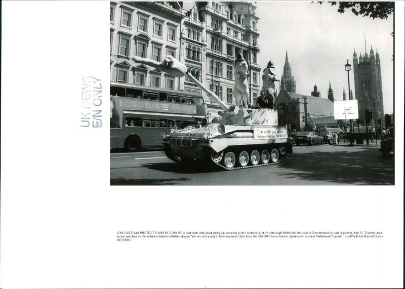 A pink tank with giant pink pigs - Vintage Photograph