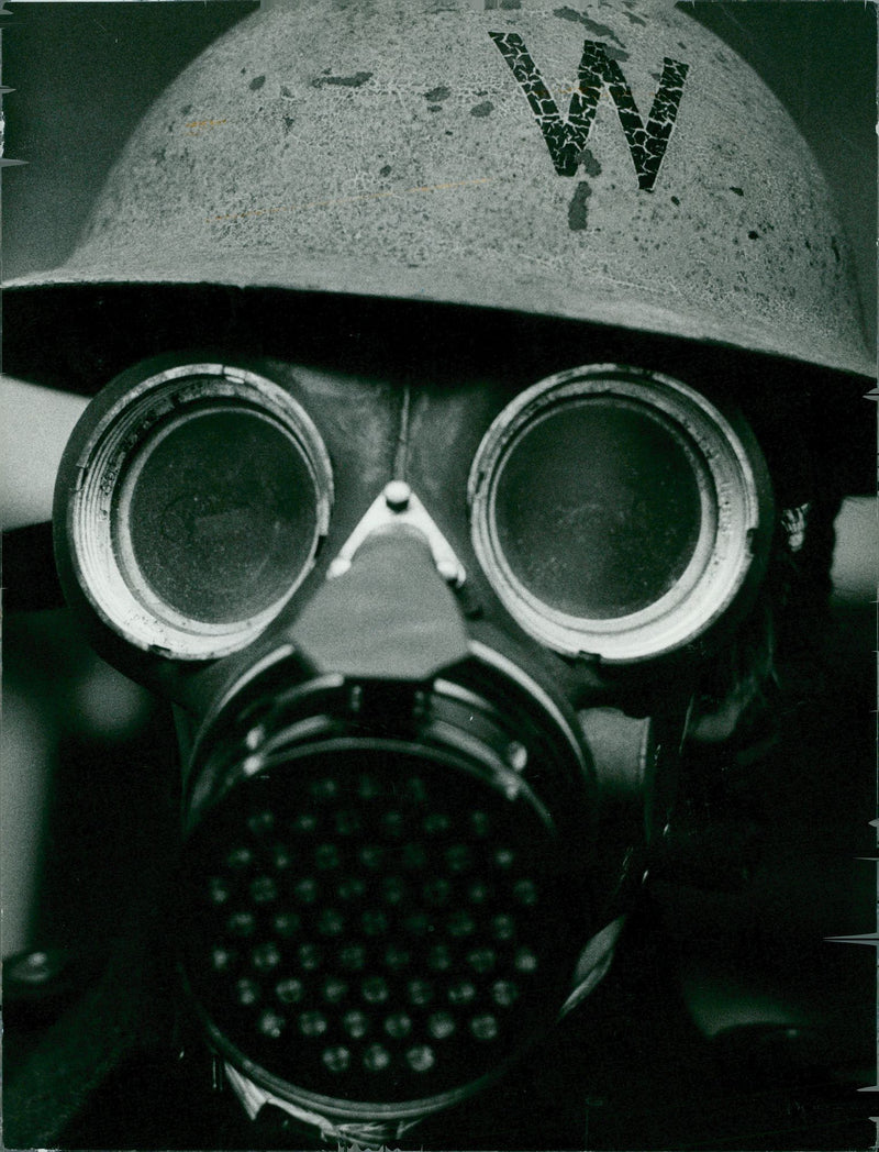 Raid Warden's gas mask and tin hat. - Vintage Photograph