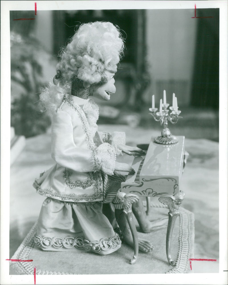 An animated antique music box with candelabra. - Vintage Photograph