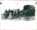Indian soldiers pushing and using drag-ropes - Vintage Photograph