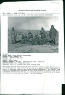 RooseThis photo showing three Japanese army soldiers guarding eight Chinese prisoners in Mongolia. - Vintage Photograph