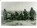 RooseThis photo showing three Japanese army soldiers guarding eight Chinese prisoners in Mongolia. - Vintage Photograph