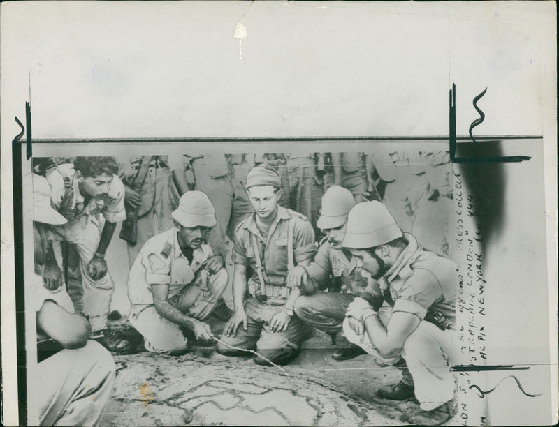 Suez Crisis: An officer briefing his men with last-minute instructions in the Sinai Desert campaign - Vintage Photograph