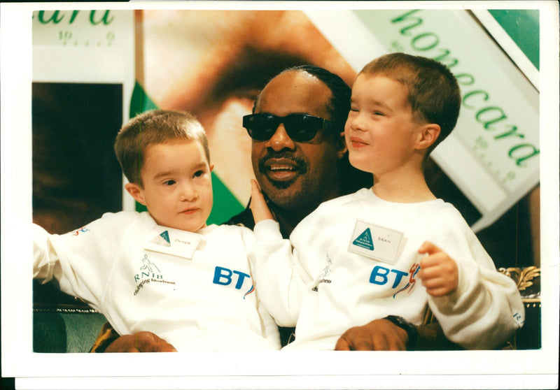 Stevie Wonder with Dean and James Mills. - Vintage Photograph