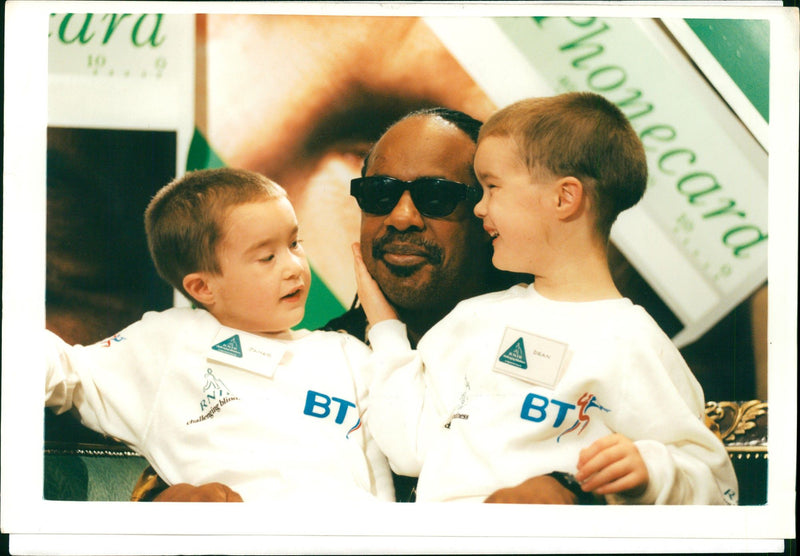 Stevie Wonder with Dean and James Mills. - Vintage Photograph