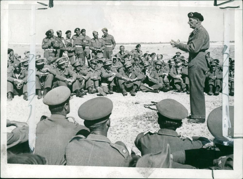 Sir Bernard Montgomery, commander of 8th army congratulating troops. - Vintage Photograph