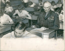 Sir Bernard Montgomery,sitting at the classroom desk. - Vintage Photograph