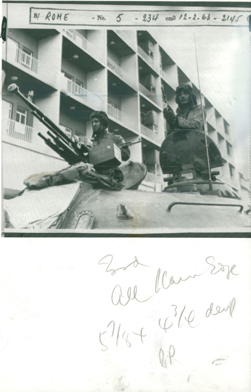 Troops manning machine guns in a tank. - Vintage Photograph