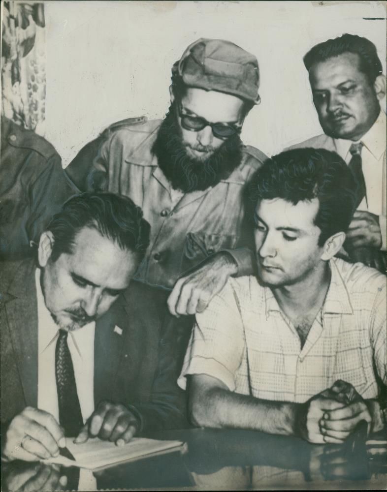 Manuel Urrutia Signs Papers at Rebel Headquarters - Vintage Photograph