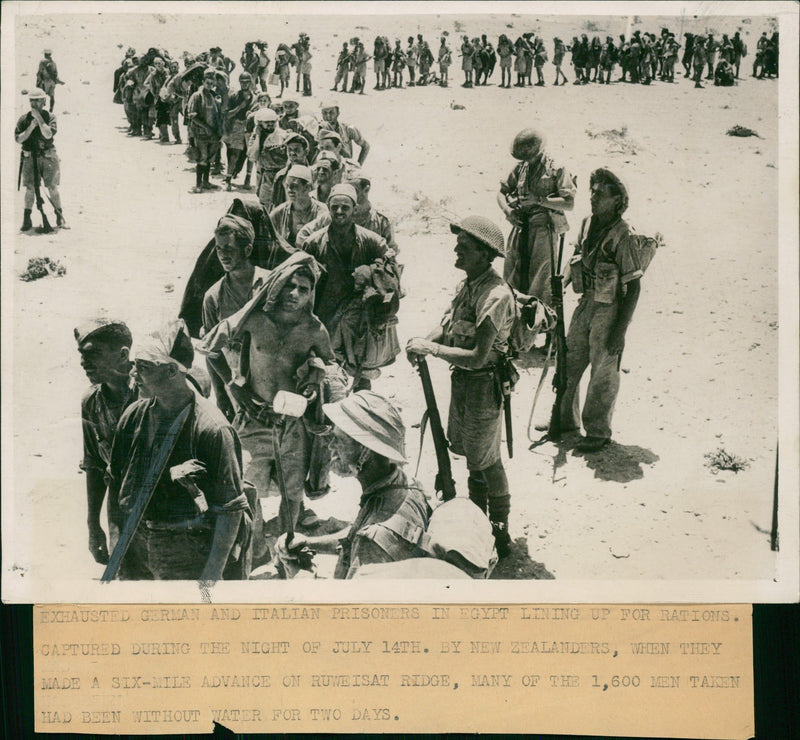 Exhausted German and Italian Prisoners. - Vintage Photograph