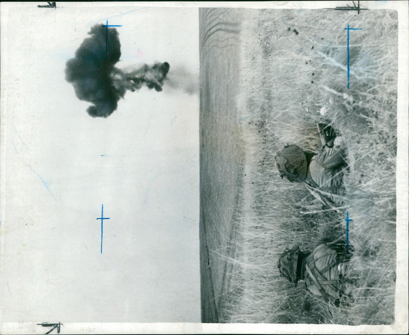 Gurkha troops taking cover in a foxhole as a simulated nuclear device was exploded on Salisbury Plain during Exercise Cross Belt. - Vintage Photograph