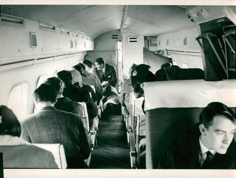 A photograph inside an aircraft. - Vintage Photograph