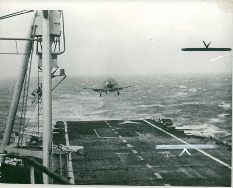 A Wyvern turboprop aircraft landing on the Ilustrious with the new aid - Vintage Photograph