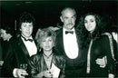 Sean Connery with his wife Micheline Roquebrune, his stepson Stephane Connery and Princess Jah, May 1984. - Vintage Photograph