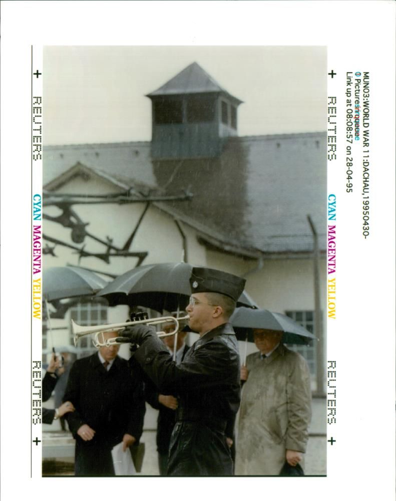 A young U.S soldier plays the trumpet. - Vintage Photograph