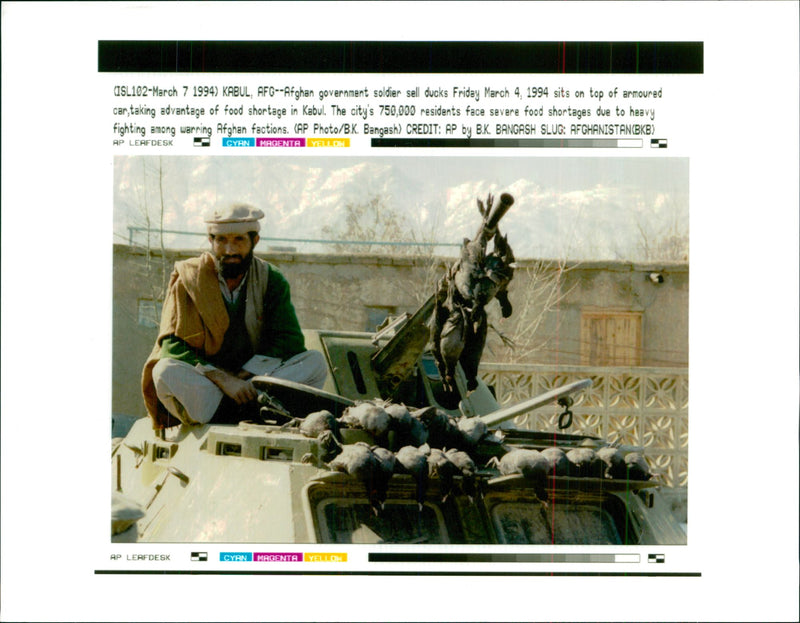 Afghan government soldier sell ducks. - Vintage Photograph