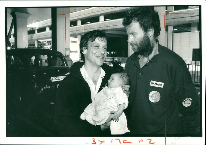 Ranulph Fiennes and Dr Mike Stroud and met his 10 day old Daughter for the first time. - Vintage Photograph