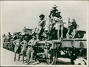 Men of a mechanted anzac unit about to unload vehicles. - Vintage Photograph