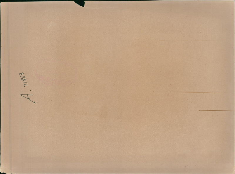 Paul McCartney greets fans during a mini-invasion of autograph seekers at the Elswick Street film location of "Bread" in Liverpool. - Vintage Photograph