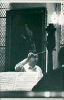 Philip Ledger conducting a rehearsal of a religious concert - Vintage Photograph