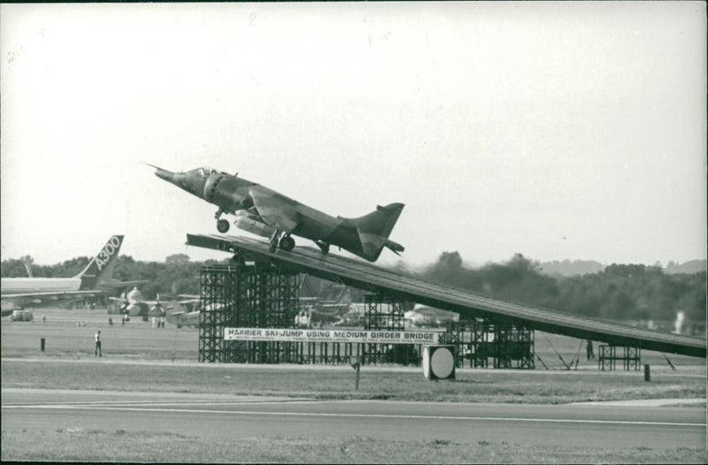 Harrier Jump Jet Aircraft taking off from ramp. - Vintage Photograph