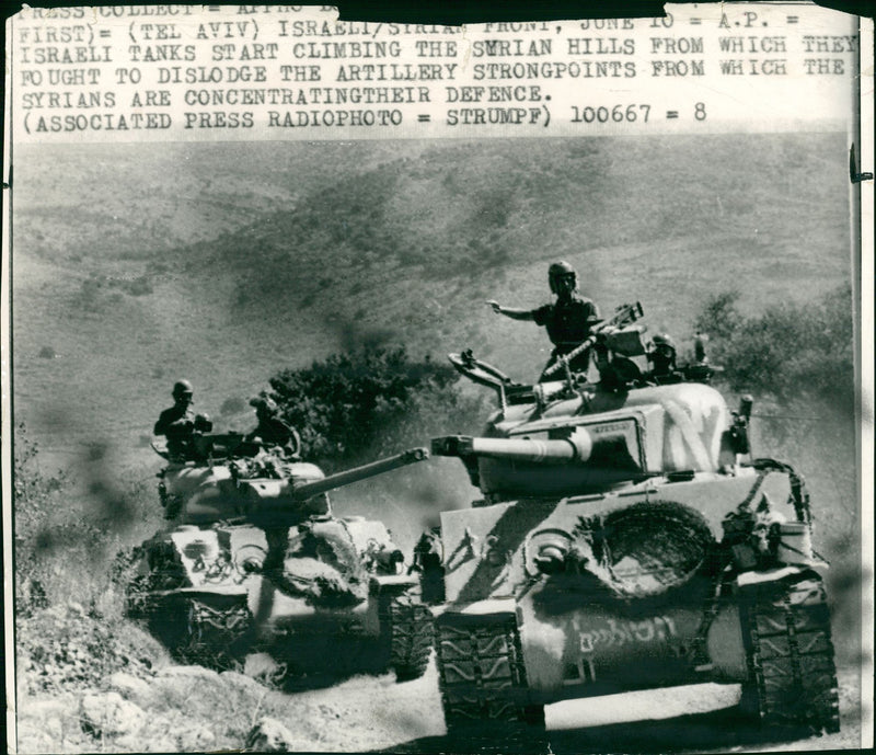 Israeli tanks pushing up the syrian hills. - Vintage Photograph