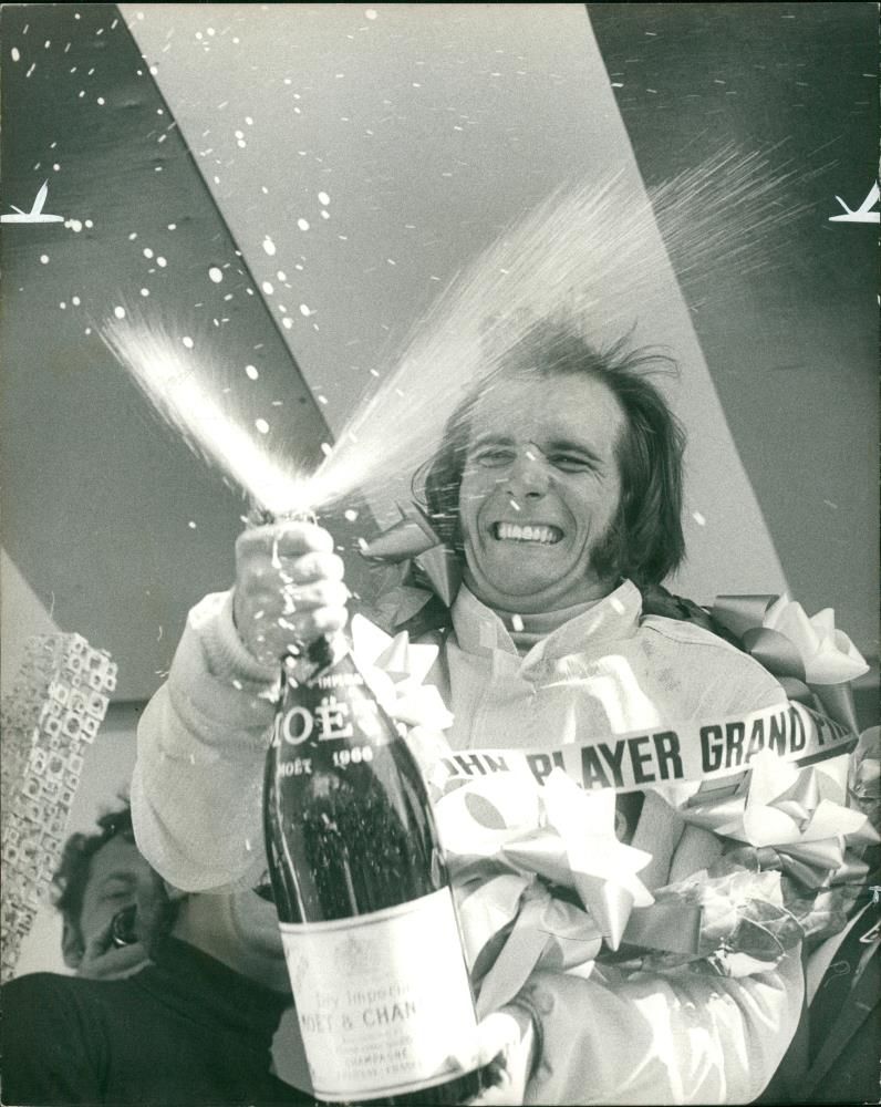 Fittipaldi after winning the British Grand Prix. - Vintage Photograph