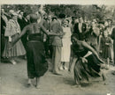 Queen Elizabeth The Queen Mother with Princess Margaret and some African dancers. - Vintage Photograph