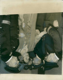 Queen Elizabeth The Queen Mother shaking hands with Mr. L. Harvey and Capt.Thompson (right). - Vintage Photograph
