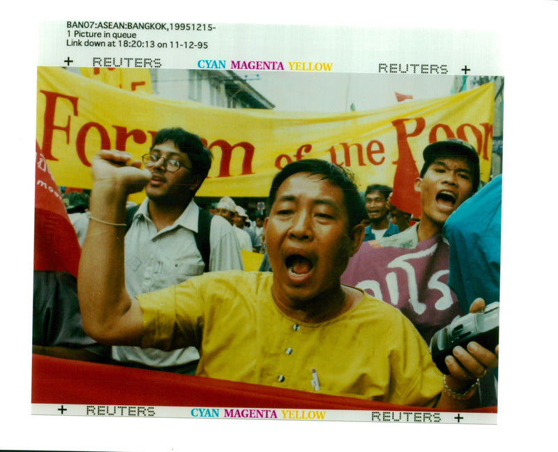 Thai protesters shouts a slogan as their march near the venue of ASEAN - Vintage Photograph